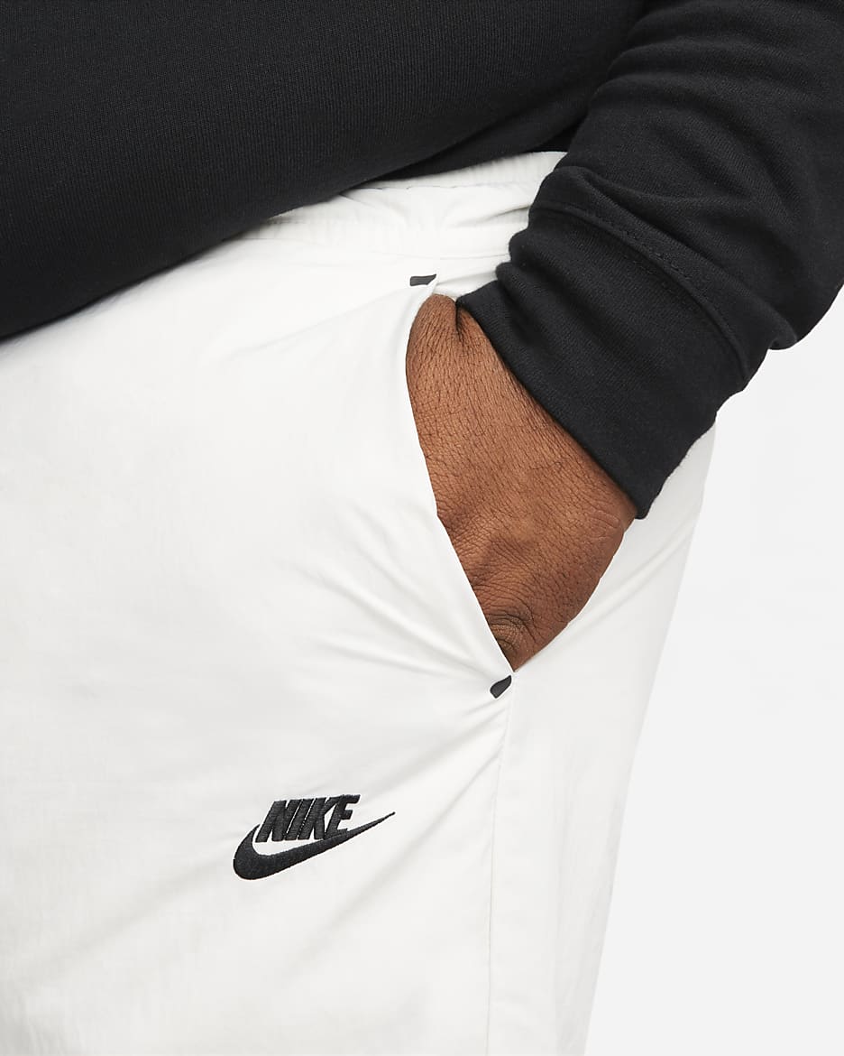 Nike Sportswear Tech Essentials Men s lined Commuter Pants. Nike